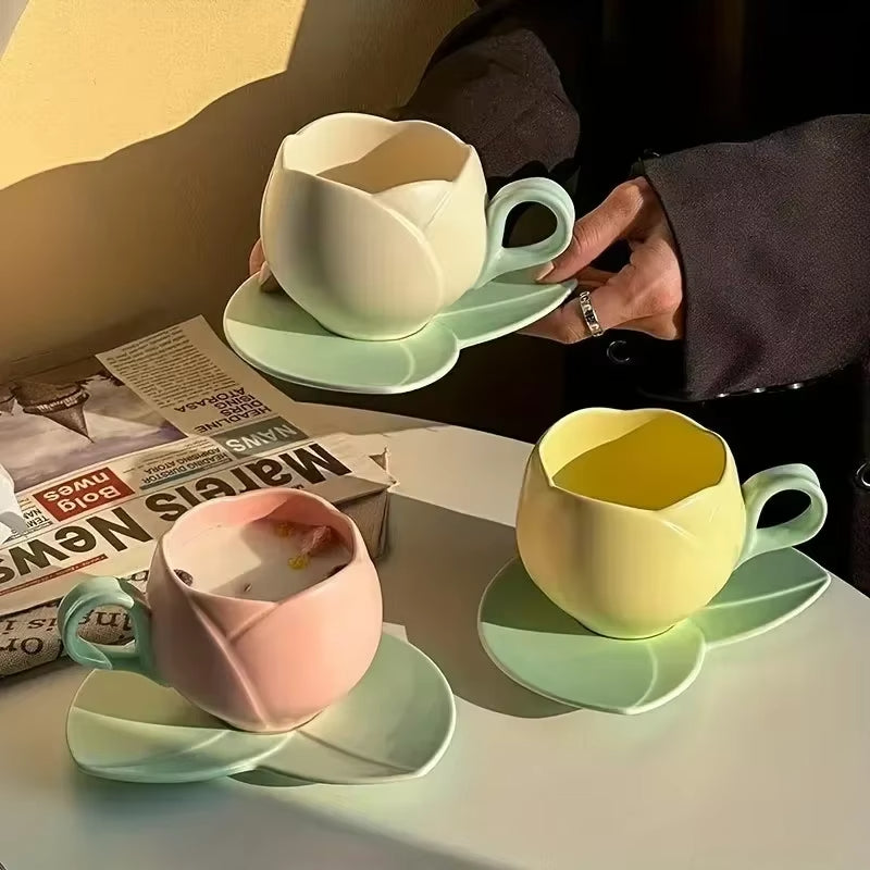 Flower shaped ceramic coffee cup and saucer