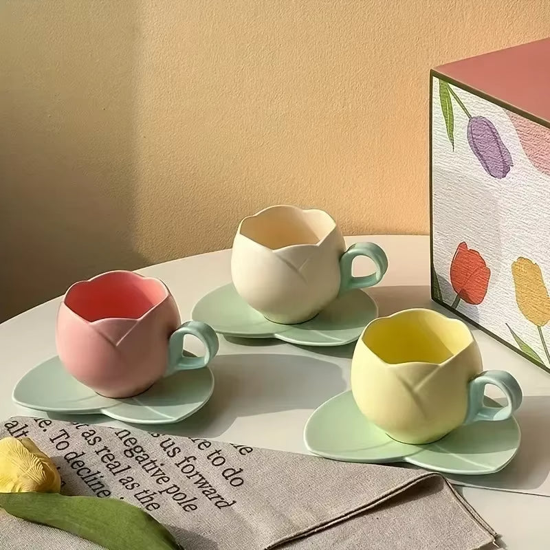 Flower shaped ceramic coffee cup and saucer