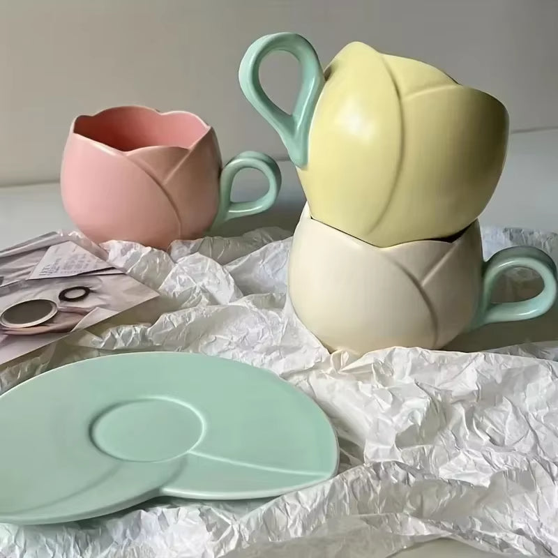 Flower shaped ceramic coffee cup and saucer