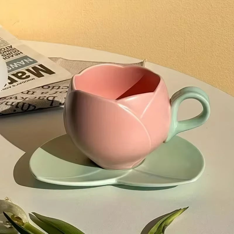 Flower shaped ceramic coffee cup and saucer